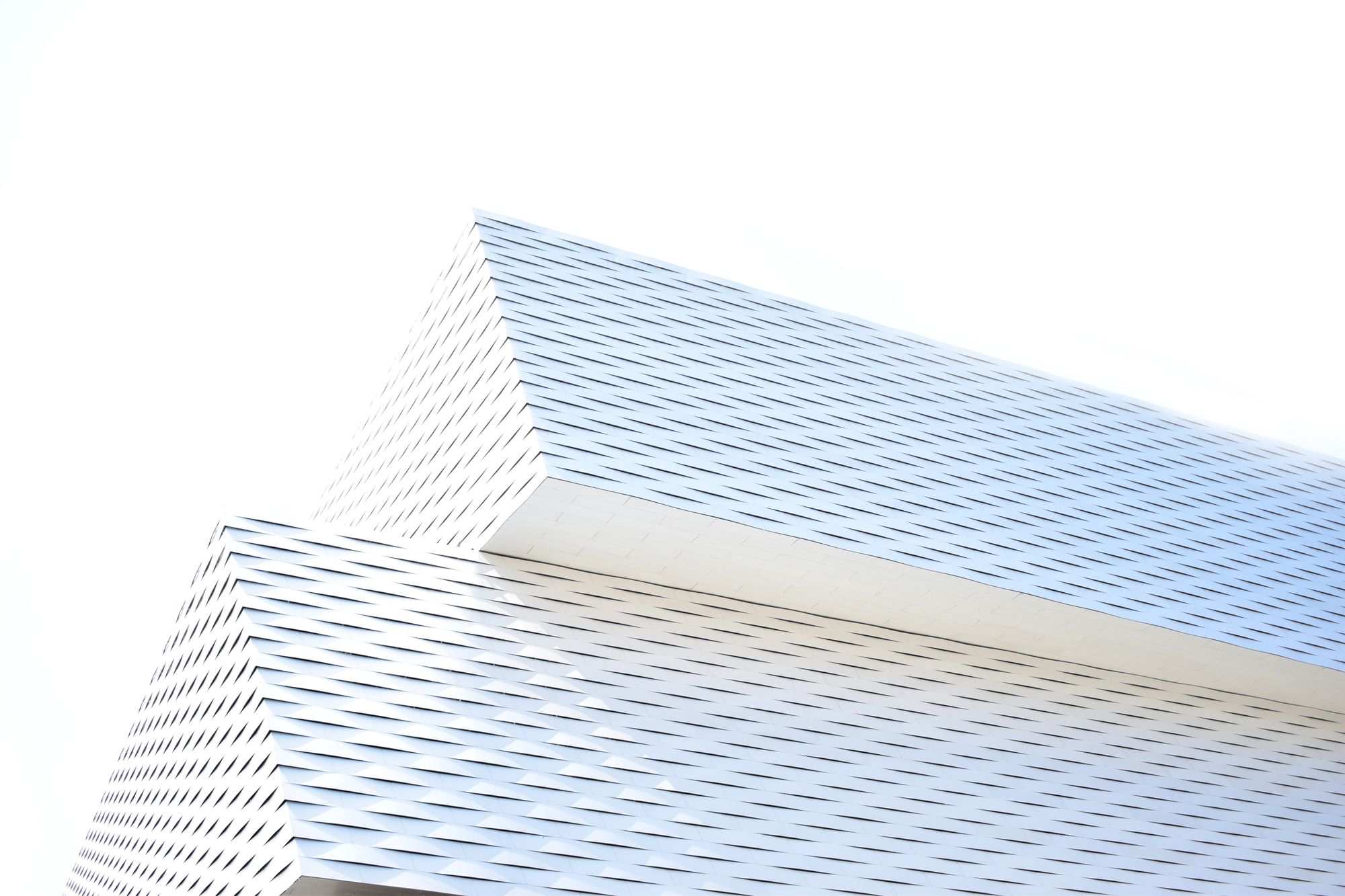 White facade with a geometric pattern